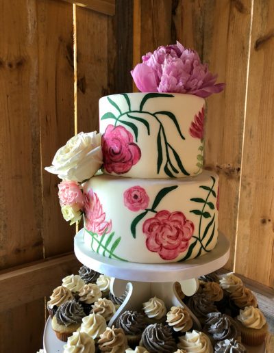 painted fondant wedding cake with real peonies and roses