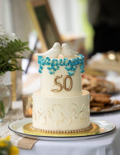 50th wedding anniversary cake with dove topper