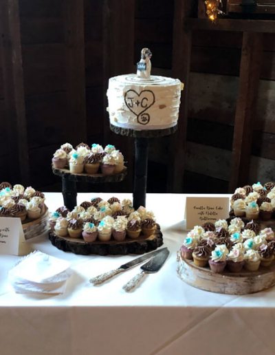 cupcake stand and wooden platters at the West Mountain Inn