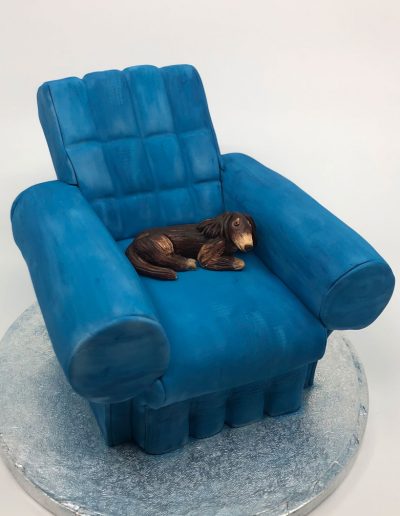 fondant dog in la-z-boy cake chair