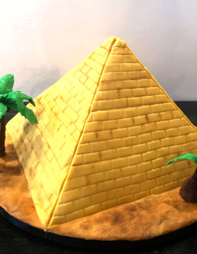pyramid birthday cake with fondant palm trees